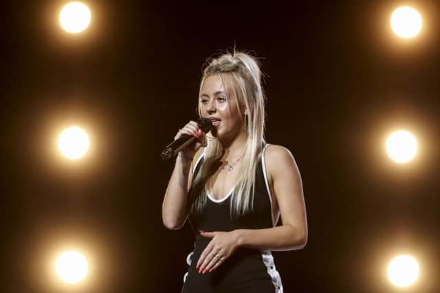 Molly Scott is through to the X Factor's new Six Chair Challenge