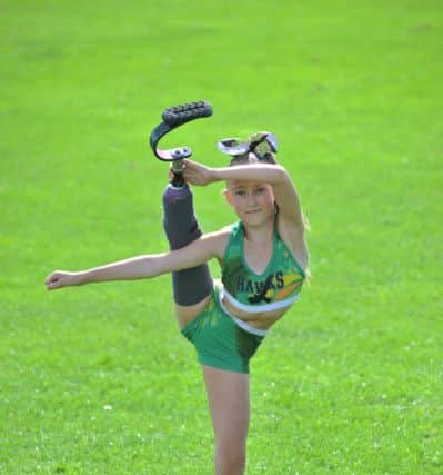Hartlepool Hawks Cheerleaders Neisha Webb with her blade.