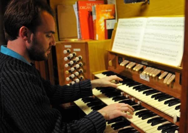 Daniel Cook playing the organ at Stranton Church. Picture by Frank Reid