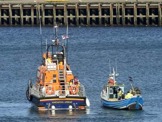 Hartlepool RNLI help a stricken vessel to safety. Photo by RNLI/Tom Collins