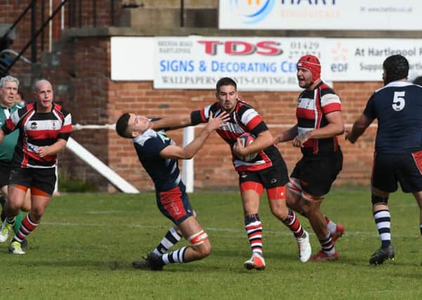 Hartlepool Rovers RFC (red/white/black) in action.