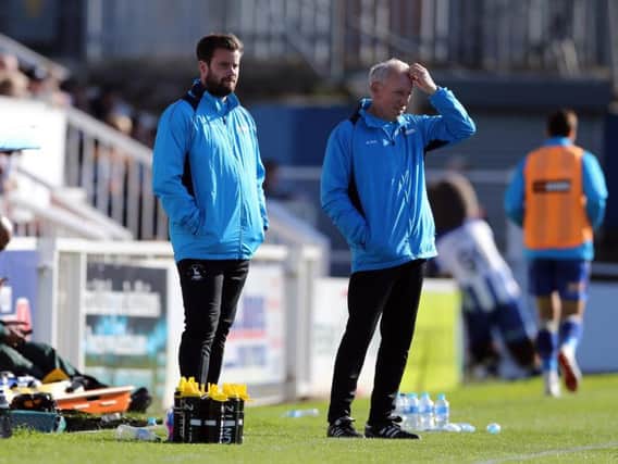 Hartlepool United boss Matthew Bates with coach Ged McNamee.