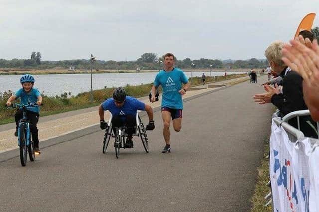Ian WItney has competed in races despite his disability.