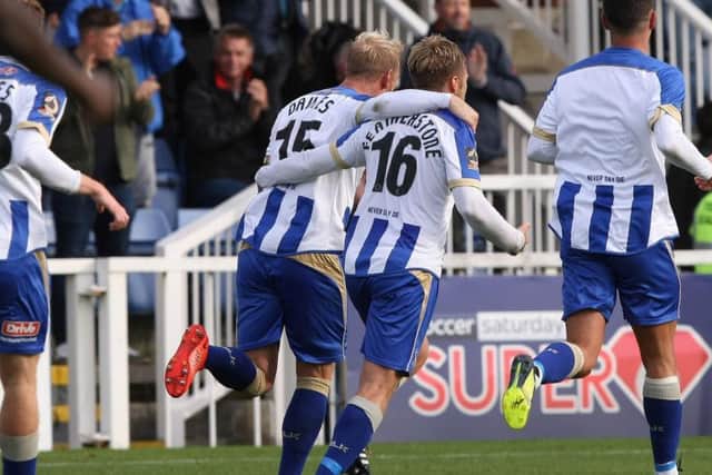 Davies celebrates his first goal in blue and white.