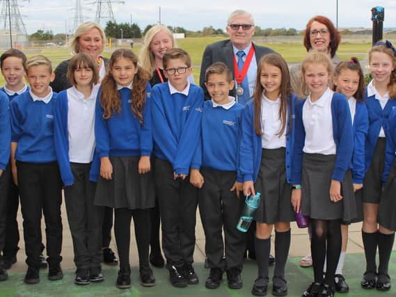 The Deputy Mayor of Hartlepool, Councillor Rob Cook, and Councillor Brenda Harrison, Chair of Hartlepool Borough Councils Childrens Services Committee, with children from Eldon Grove Academy.