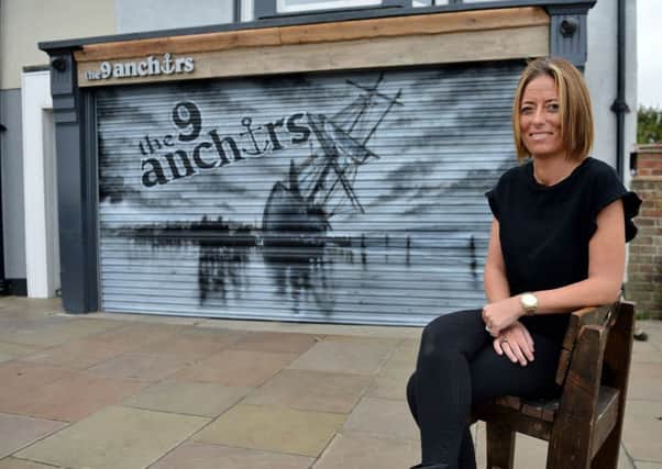 9 Anchors Micro Pub, bar manager Lorna Hogan outside of the pub. Picture by FRANK REID