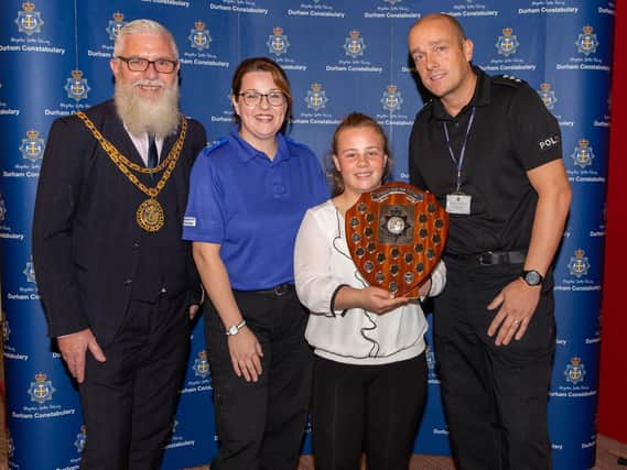 Mayor Scott Meikle, PCSO Michelle Burr, Olivia Ward and Temporary Chief Inspector Lee Blakelock with their award.