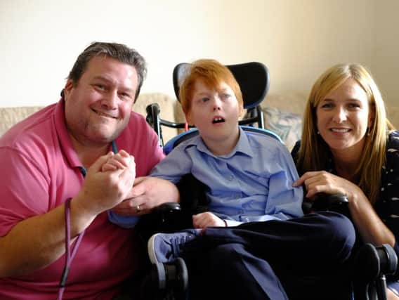 Peter Kelly and Benjamin with Paula Gascoigne of Smile for Life.