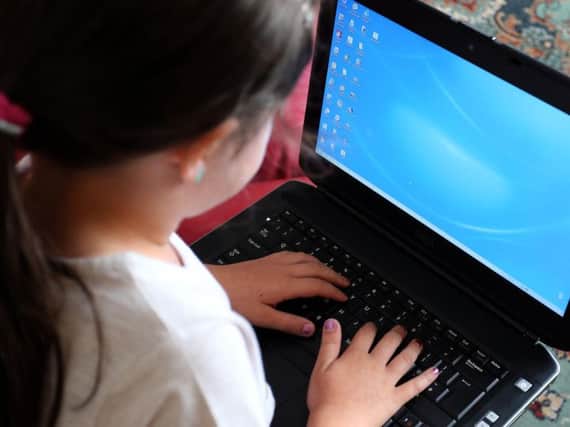 More than half of parents are worried that screen time is fuelling their child's inactive lifestyle. Pic: Peter Byrne/PA Wire.
