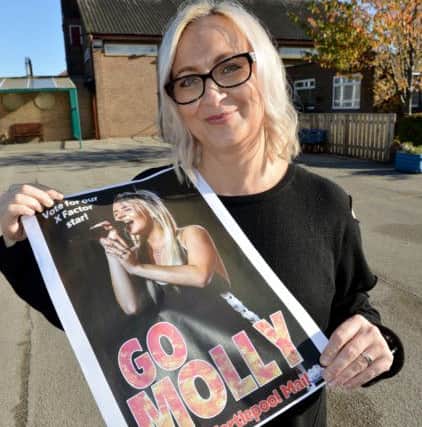 Molly Scott's mum Louise with the Hartlepool Mail "Go Molly" poster.