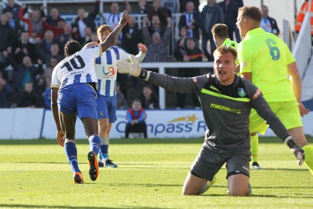 Hartlepool United's Niko Muir runs away to celebrate after putting them into a 1-0 lead against Kidsgrove Athletic.