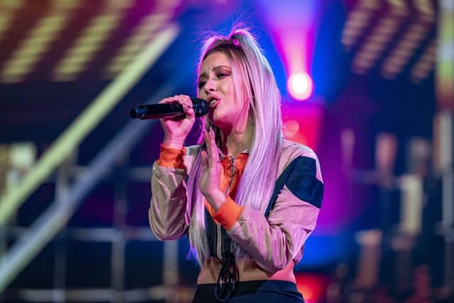 Molly Scott performs on the first X Factor live show. Picture: Thames/Syco/ITV.