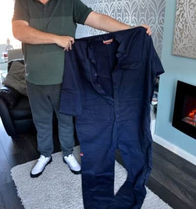 Slimmer Ian Joy with a pair of his over sized overalls.