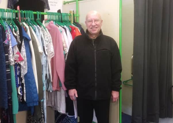 Charlie Coomer who works as a volunteer in the Alice House Hospice shops - and always puts a spring in the step of customers.