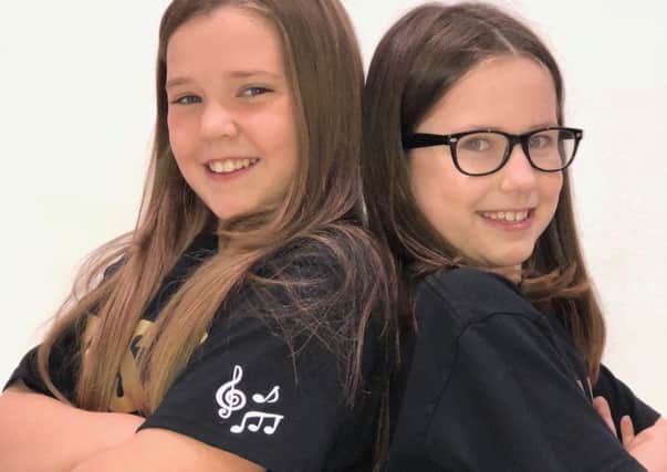 Amelia Nixon, 10, and Poppy Edwards, nine, of Miss Toni's Academy who will play Amy Cratchit in A Christmas Carol at Billingham Forum Theatre.