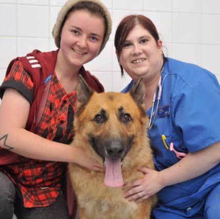 Laura Marshall (left) and Max with veterinary nurse Leanne Merrington