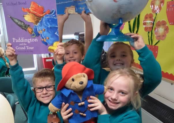 Clavering pupils (from left to right): Benjamin, Oliver, Leah and Ava with Paddington Bear.