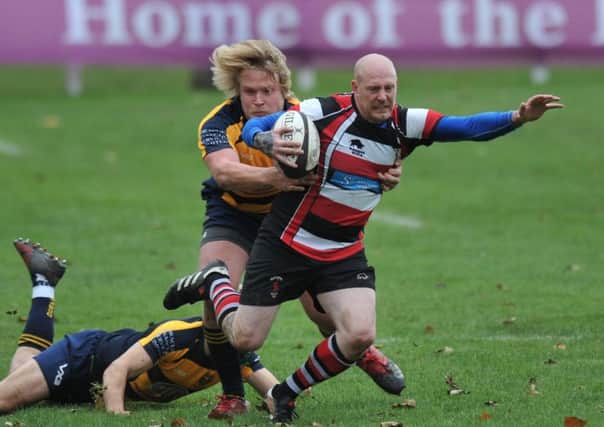 Rugby between Durham City RFC (yellow/navy) and Hartlepool Rovers, played at Hollow Lane, Durham.