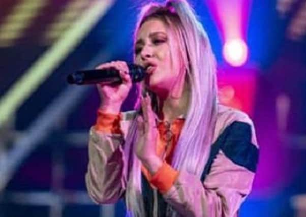 Molly Scott was voted off the X Factor after a tense sing-off on Sunday night. Picture from ITV.