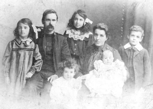 The Avery family, including James A Gilman's mother sitting at the front.