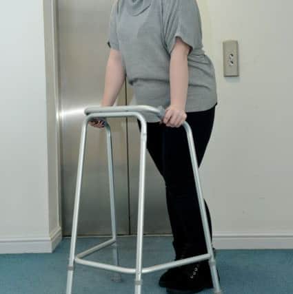A walking frame being used