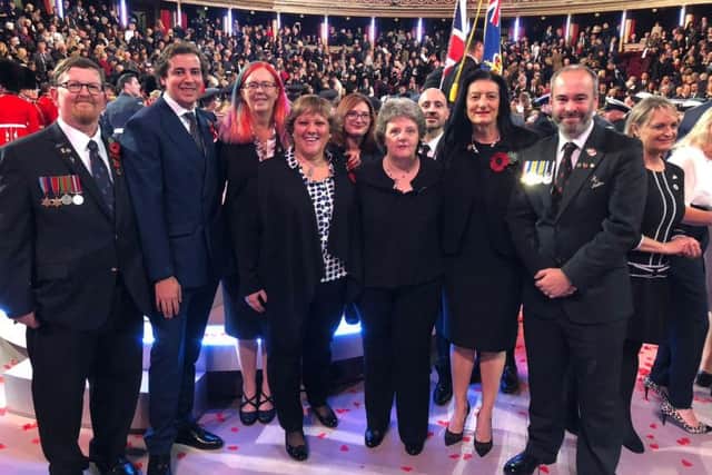 Sian Cameron with other Poppy Appeal representatives and poppy factory workers at the Royal Festival of Remembrance.