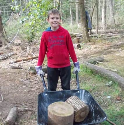 Clavering Primary pupil Kyle embraced the outdoor conservation work towards the John Muir Award