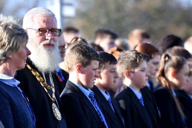 Mayor of Peterlee Councillor Scott Meikle and pupils from Dene Community School observe a minutes silence during the Service of Remembrance. Picture by FRANK REID