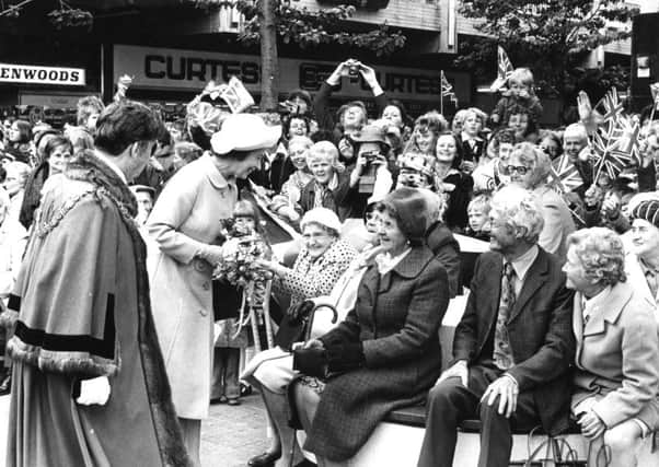 Queen Elizabeth II visits Middleton Grange shopping centre in 1977.