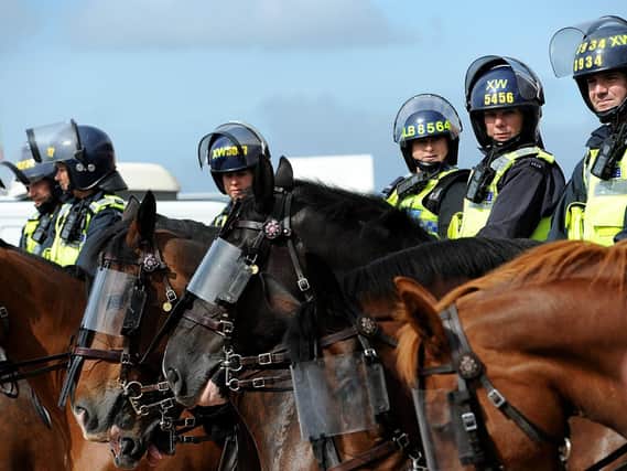 Police watching over a derby match in 2011