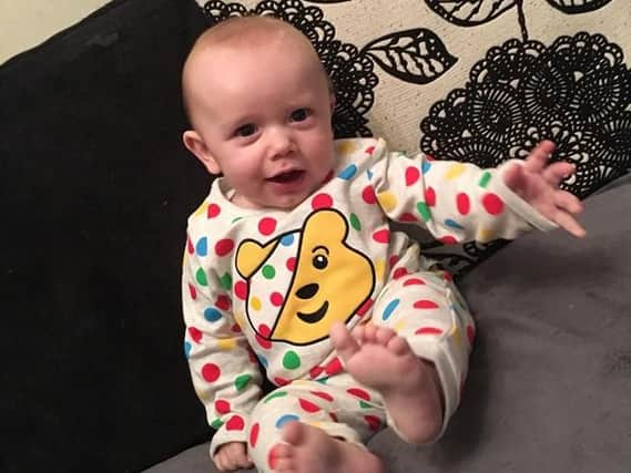 Eight-month-old Vinnie James Jewson from Hartlepool in his Pudsey pyjamas