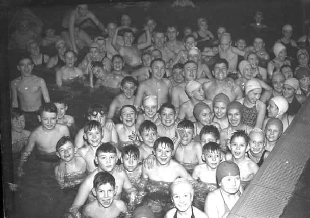 Children enjoying a trip to the baths.
