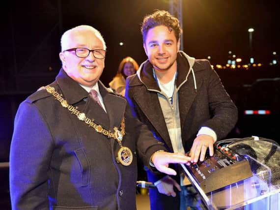 Coun Paul Beck and Adam Thomas at last year's lights switch-on.