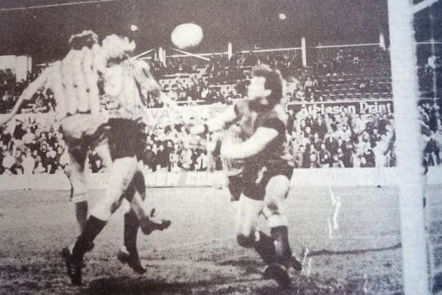 Dixon heads home to score Pools third against Colchester in 1985.