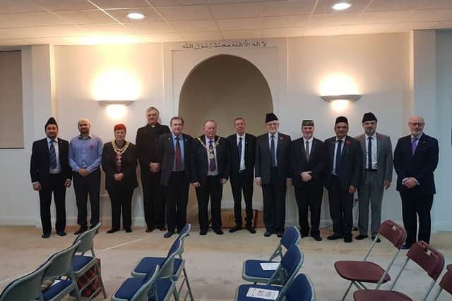 From left: Farhan Ali, Dr Bilal Tahir, Mayor of Darlington Councillor Veronica Copeland, Father Graeme Buttery of St Oswald's Church, Barry Coppinger, Councillor Allan Barclay, Mike Hill MP, Bilal Atkinson, Tahir Selby, Dr Irfan Malik, Syed Hashim Ahmad and Brigadier PJA Baker OBE.