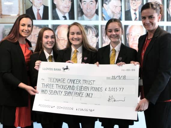 Pupils and staff delighted by the fundraising sum.