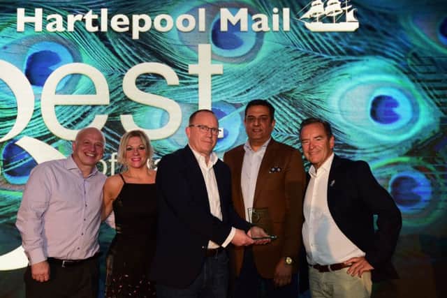 Editorial director Joy Yates presents the Outstanding Achievement Award, sponsored by the Hartlepool Mail, to  Ian Scobbie, board member, Mark Maguire chief executive, Raj Singh chairman and President Jeff Stelling, all from Hartlepool United.