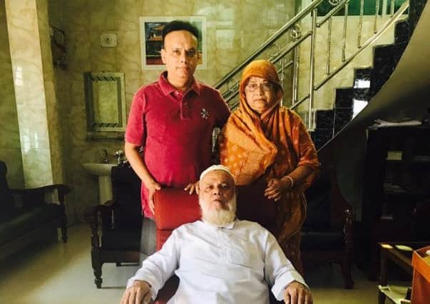 Syed Dulal (left) with his mother Jamirun Nessa and father Syed Habibur Rahman