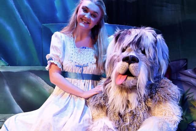 Wendy (Mollie Shellard) with her dog (Julian Riley) in Peter Pan at the Forum Theatre. Picture by FRANK REID