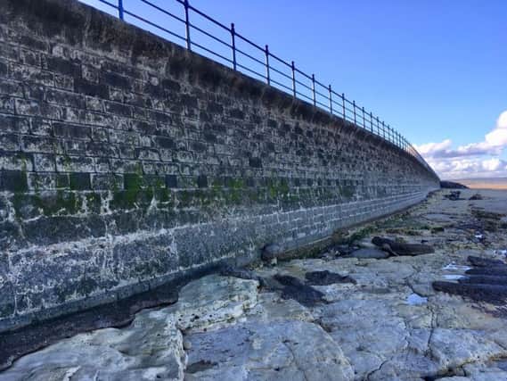 Work on the sea wall on the Headland will not continue as originally planned.