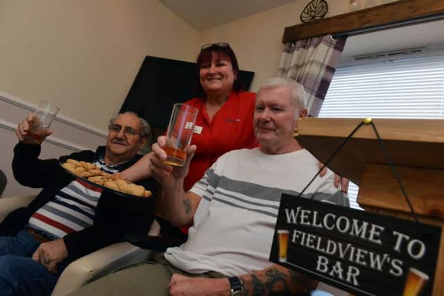 Field View Care Home opens its new bar, The Field View Arms.
Residents from left Stan Spowart and Jim Brown with deputy manager Karen Collins