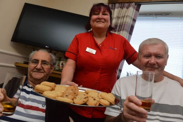 Field View Care Home opens its new bar, The Field View Arms.
Residents from left Stan Spowart and Jim Brown with deputy manager Karen Collins
