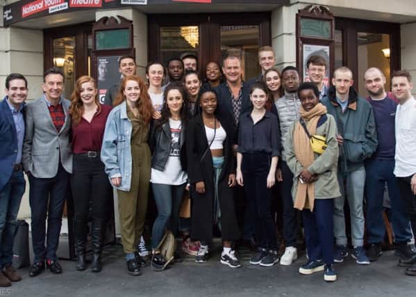 Hugh Bonneville, centre, with members of the NYT West End REP company