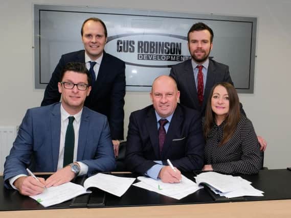 Back row, from left, David Nixon and Carl Swansbury from RG Corporate Finance. Front Row: Craig Taylor (Thirteen), Stephen Bell (Gus Robinson Developments) and Jeanette Henderson (Gus Robinson Developments).