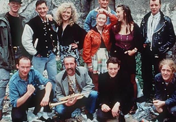 (3rd from left, second row) Jane designed the outfit worn by Maria Doyle Kennedy in The Commitments (Image from Janes personal archive)