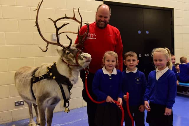 Pictured with George Richardson of Rent a Reindeer and (left-right) Amelia Hull, Jack Smith and Stevie Mincer.