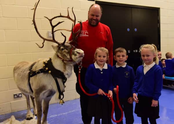 Pictured with George Richardson of Rent a Reindeer and (left-right) Amelia Hull, Jack Smith and Stevie Mincer.