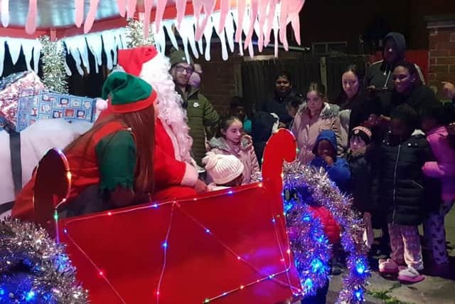 Santa delights children during Hartlepool Round Table's Santa Run of the town.