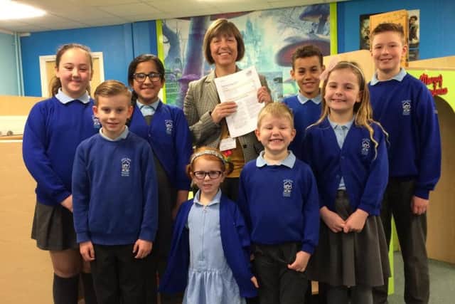Headteacher Amanda Hall with West Park Primary School pupils.