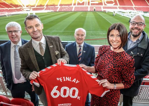 Colin and Julie Cooper at Middlesbrough FCs Riverside Stadium with Finlay Cooper Fund trustees, (from left), Nick Waites, Graham Fordy and Lee Bramley.